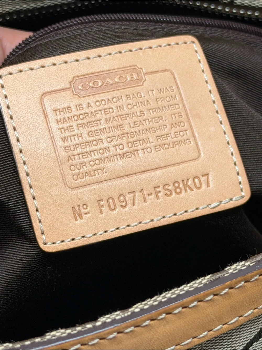 Coach iconic signature